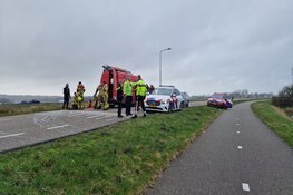 Auto te water nabij Schoorldam