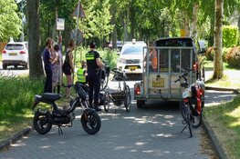 Driewielerfiets rijdt tegen aanhanger in Bergen